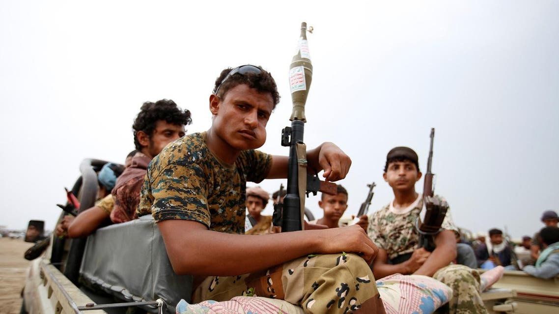 Houthi fighters ride on the back of a truck during a parade in the Red Sea port city of Hodeidah, Yemen August 24, 2017. REUTERS/Abduljabbar Zeyad