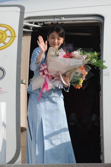 Princess Mako waves prior to her departure from Paro Airport in Bhutan on June 7, 2017. (AFP)