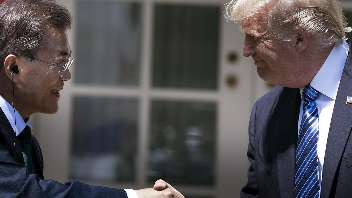 South Korea's President Moon Jae-in and US President Donald Trump shaking hands in the Rose Garden of the White House in Washington, DC. Trump and Moon agreed on September 4, 2017. AFP