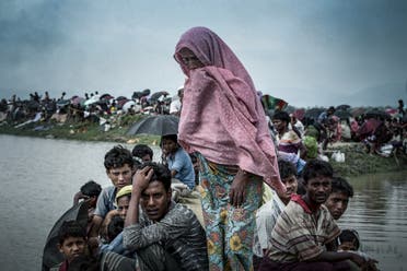 Displaced Rohingya refugees from Rakhine state in Myanmar rest near Ukhia, near the border between Bangladesh and Myanmar. (K.M. ASAD / AFP)