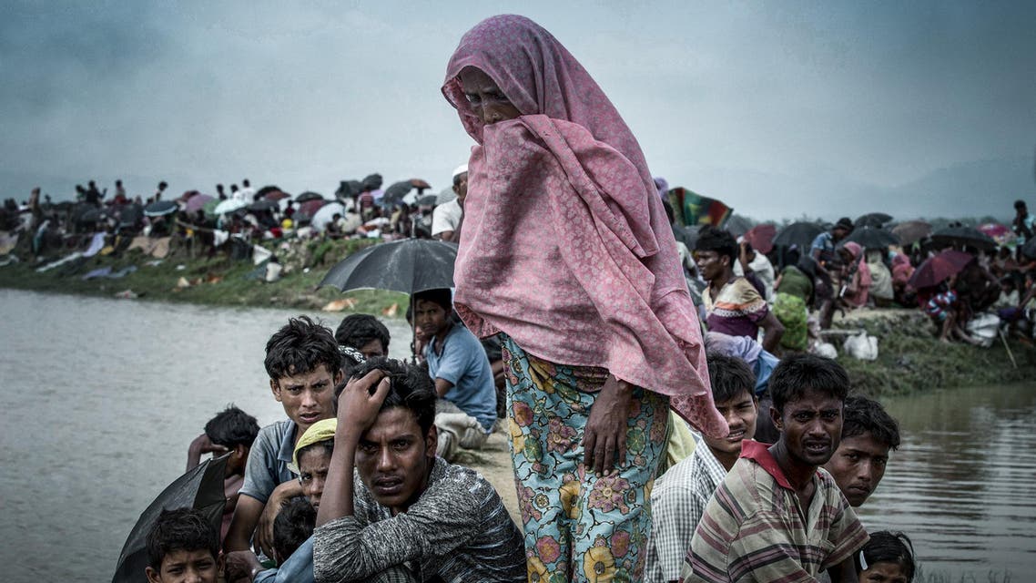 Displaced Rohingya refugees from Rakhine state in Myanmar rest near Ukhia, near the border between Bangladesh and Myanmar. (K.M. ASAD / AFP)