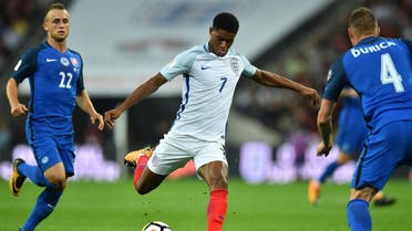 England's striker Marcus Rashford shoots to score England's second goal during the World Cup 2018 qualification football match between England and Slovakia at Wembley Stadium in London on September 4, 2017. (AFP)