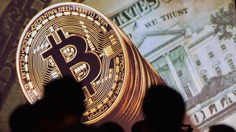 Bitcoin hits new record high of $11,850