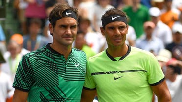 KEY BISCAYNE, FL - APRIL 02: Roger Federer of Switzerland (left) and Rafael Nadal of Spain (right) pose before the men's final match on day 14 of the Miami Open at Crandon Park Tennis Center on April 2, 2017 in Key Biscayne, Florida. Rob Foldy/Getty Images/AFP 