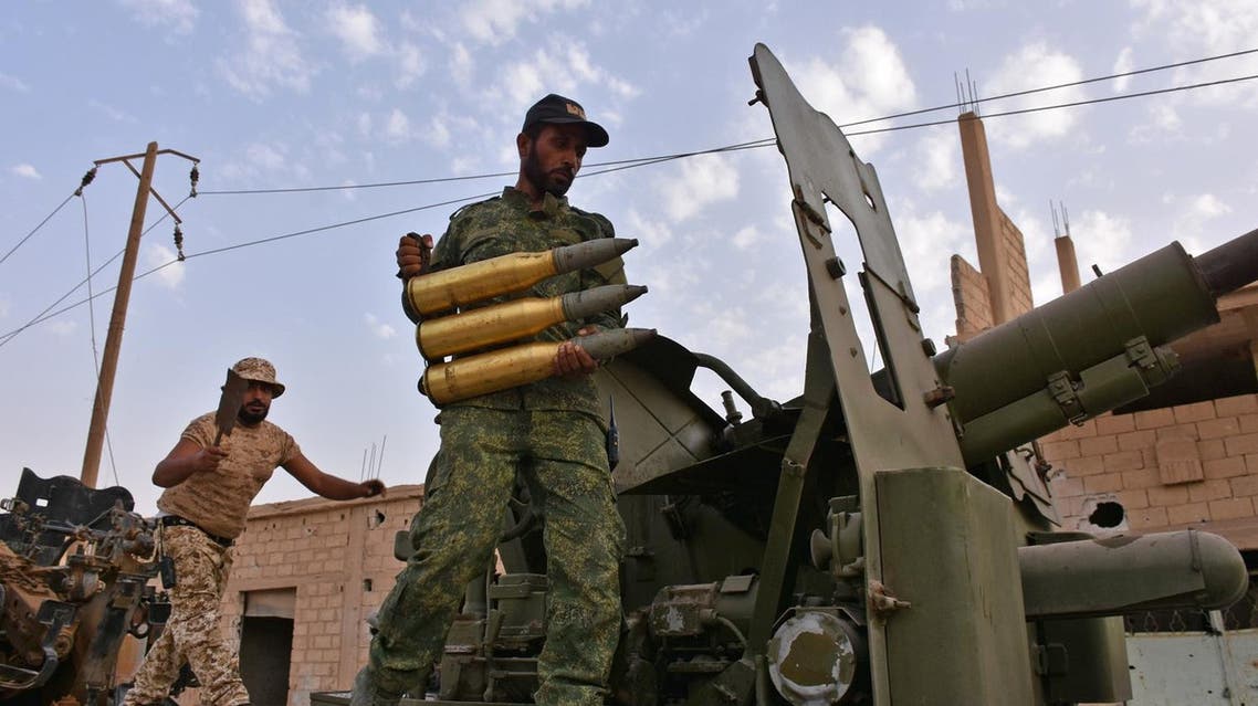 Syrian government forces prepare to fire artillery shells in the area of Kobajjep some 40 kilometres west of Deir Ezzor in the ongoing battle against Islamic State (IS) group jihadists on September 5, 2017. Syria's army broke a years-long Islamic State group siege on the government enclave of Deir Ezzor city as it battles to expel the jihadists from a key stronghold. (AFP)