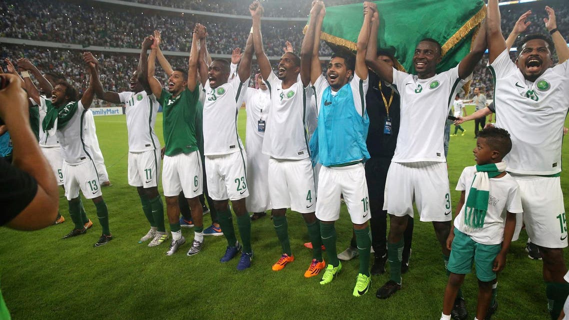 Saudi Arabia players celebrates after winning the 2018 World Cup group B qualifying soccer match between Saudi Arabia and Japan in Jeddah, Saudi Arabia, Tuesday, Sept. 5, 2017. (AP)