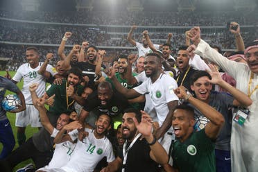 Saudi Arabia's fans cheer during the FIFA World Cup 2018 qualification football match. (AFP)