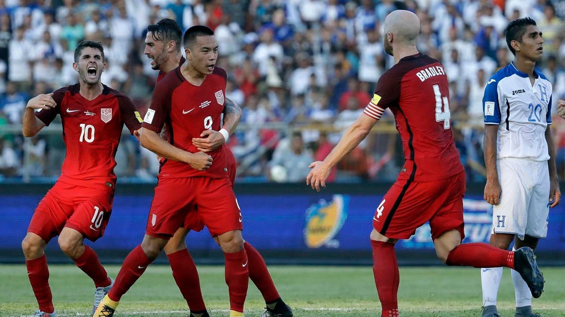 United States' Bobby Wood, 9, celebrates with teammates after scoring his team's first goal during a 2018 World Cup qualifying soccer match against Honduras in San Pedro Sula, Honduras, Tuesday, Sept. 5, 2017. (AP)