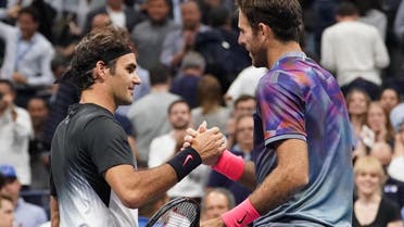 Roger Federer (left) greets Juan Martin del Potro after their US Open tennis match. (Robert Deutsch-USA TODAY Sports/Reuters)
