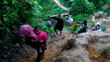 Rohingya Muslims flee Myanmar violence