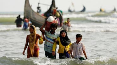 Rohingya Muslims flee Myanmar violence