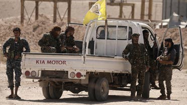Fighters from Deir al-Zor military council which fights under the Syrian Democratic Forces (SDF) sit on a back of a truck in the village of Abu Fas, Hasaka province, Syria September 9, 2017. REUTERS/Rodi Said