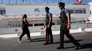 Italian Carabinieri are seen as they patrol in front of the entrance of the Palazzo del Cinema a day before the opening of the 74th Venice Film Festival in Venice. (File photo: Reuters)