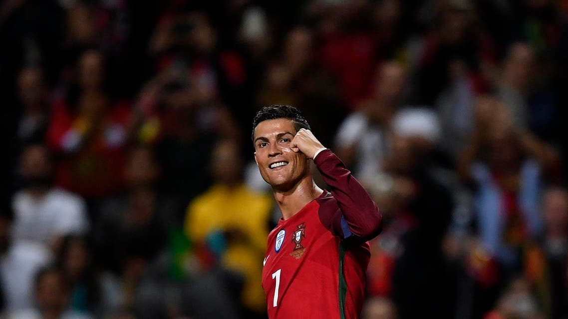 Portugal's forward Cristiano Ronaldo celebrates after scoring a goal during the WC2018 qualifying football match Portugal vs Faroe Islands at the Bessa stadium in Porto on August 31, 2017. (AFP)