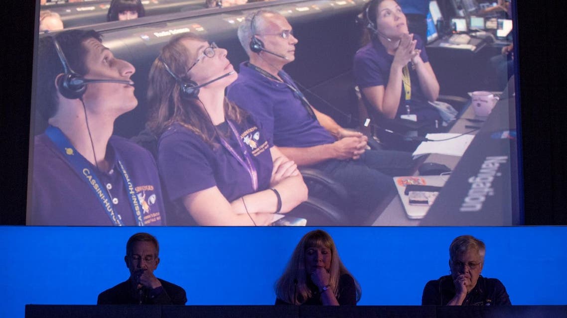Cassini program staff watch a replay of the final moments of the Cassini spacecraft during a press conference in Pasadena, California, US, on September 15, 2017. (Reuters)