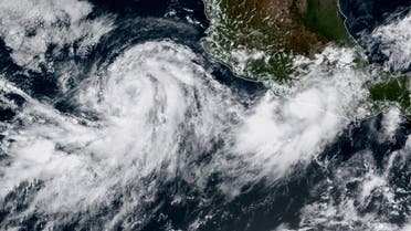 This satellite image obtained from the National Oceanic and Atmospheric Administration (NOAA) shows Hurricane Max (R) and Tropical Storm Norma on September 14, 2017. (AFP)