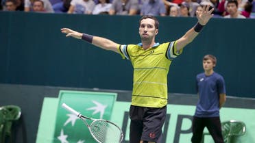 azakhstan’s Mikhail Kukushkin celebrates his victory over Argentina’s Diego Schwartzman Davis Cup after the play-off tennis match in Astana, on Sept. 17, 2017. (AP) 