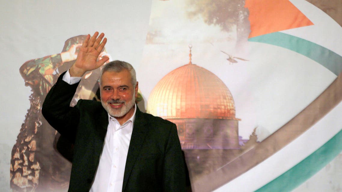 Hamas Chief Ismail Haniyeh waves before giving a speech in Gaza City. (File photo: Reuters)