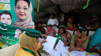 Pakistanis vote in by-election seen as test of support for ousted PM Sharif