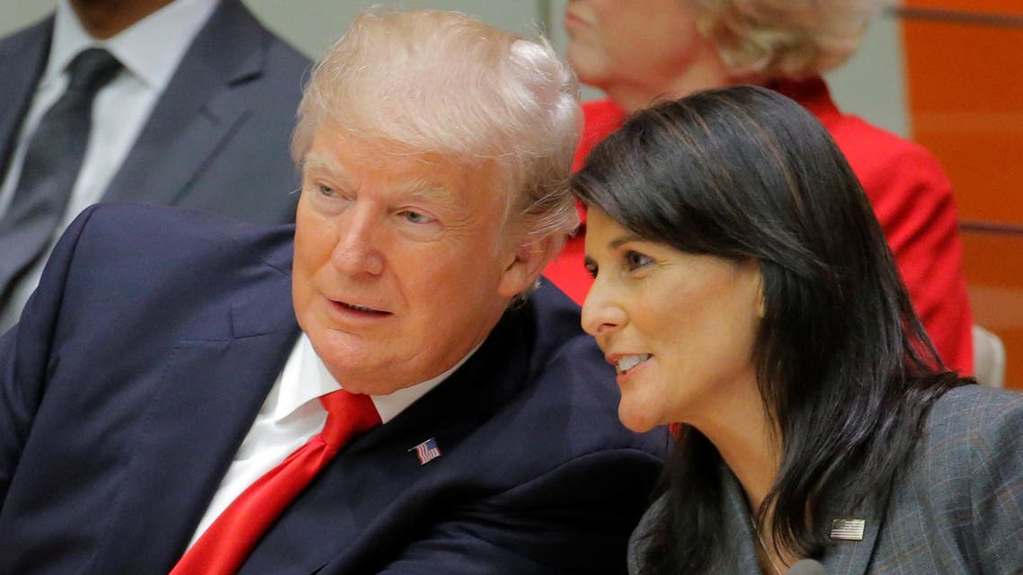 U.S. President Donald Trump talks with U.S. Ambassador to the U.N. Nikki Haley as they attend a session on reforming the United Nations at U.N. Headquarters in New York, U.S., September 18, 2017. REUTERS/Lucas Jackson