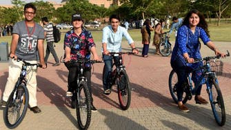 Campus bikes liberate Pakistan’s female students