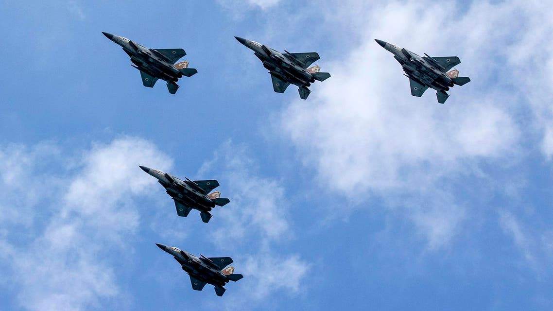 Israeli F-15 fighter jets perform during an air show over the beach in the Israeli coastal city of Tel Aviv on May 02, 2017. (AFP)