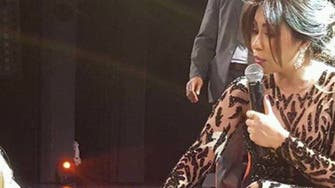 The Egyptian Adele? Singer Sherine kisses hand of fan at Paris concert