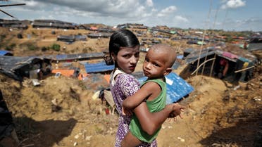 Rohingya refugee children pose for a photo in Cox's Bazar, Bangladesh, September 21, 2017. 9Reuters)