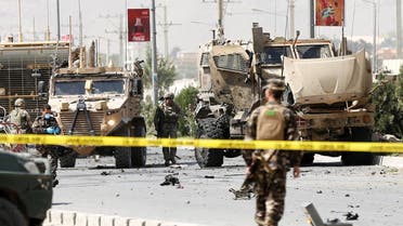 NATO troops investigate a Danish convoy at the site of a car bomb attack in Kabul, Afghanistan. September 24, 2017. (Reuters)