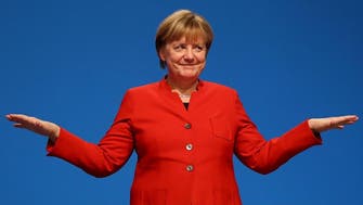 Merkel claims mandate to form new German government