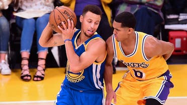 (FILES) This file photo taken on November 4, 2016 shows Stephen Curry of the Golden State Warriors looking to pass under pressure from Jordan Clarkson of Los Angeles Lakers in their NBA game in Los Angeles, California. President Donald Trump triggered a backlash from the US professional sports world on September 23, 2017, withdrawing a White House invitation to the NBA champion Golden State Warriors after condemning NFL players protesting the national anthem. A day after Trump had decried activist National Football League stars as "sons of bitches" who should be fired for kneeling or sitting during renditions of The Stars and Stripes, the US leader turned his ire to basketball's reigning champions and star player Stephen Curry. (AFP)