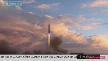 A TV grab taken on September 23, 2017 from the Iranian Republic Islamic Broadcasting (IRIB) shows a Khoramshahr missile being launched from an undisclosed location, a day after the said missile was first displayed at a high-profile military parade in the capital Tehran. Iran said on September 23, 2017 that it had successfully tested the new medium-range missile in defiance of warnings from Washington that such activities were grounds for abandoning their landmark nuclear deal. Handout / IRIB TV / AFP