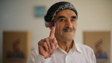 A man shows his ink-stained finger during Kurds independence referendum in Erbil. (Reuters)