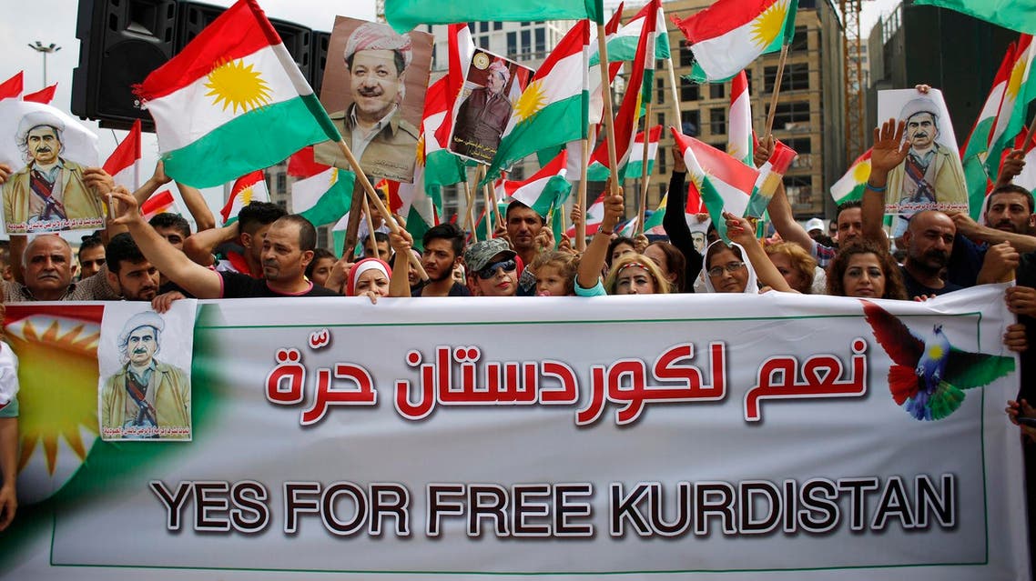 Kurds wave Kurdish flags while gathering to support referendum in Iraq, at Martyrs Square in Downtown Beirut, Lebanon, on Sept. 17, 2017. (AP)