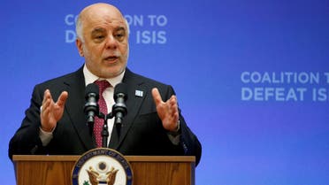 FILE PHOTO:Iraqi Prime Minister Haider al-Abadi delivers remarks at the morning ministerial plenary for the Global Coalition working to Defeat ISIS at the State Department in Washington, U.S., March 22, 2017. REUTERS/Joshua Roberts/File Photo