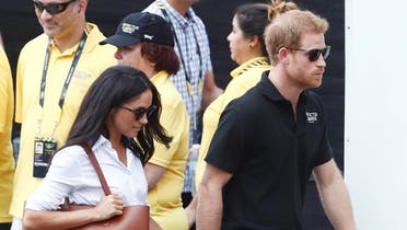 Britain's Prince Harry (R) arrives with girlfriend actress Meghan Markle at the wheelchair tennis event during the Invictus Games in Toronto, Ontario, Canada September 25, 2017. REUTERS/Mark Blinch