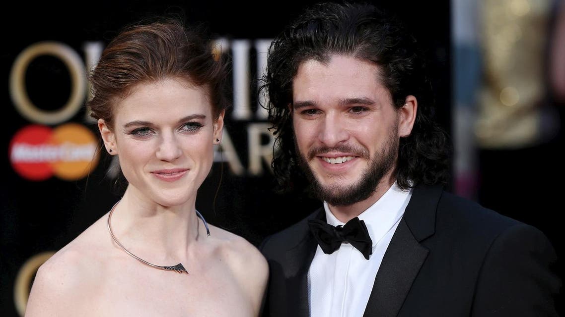 British actors Kit Harington (R) and Rose Leslie pose for photographers as they arrive at the Olivier Awards at the Royal Opera House in London, Britain, April 3, 2016. (Reuters)