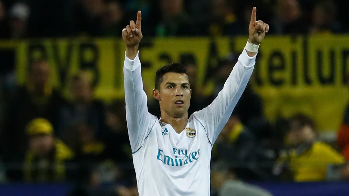 Real Madrid's forward from Portugal Cristiano Ronaldo celebrates scoring during the UEFA Champions League Group H football match BVB Borussia Dortmund v Real Madrid in Dortmund, western Germany on September 26, 2017. (AFP)