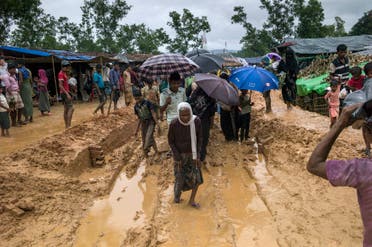 Rohingya Muslim refugees walk through Kutupalong refugee camp in the Bangladeshi district of Ukhia on September 28, 2017. (AFP)