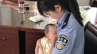 Chinese policewoman breastfeeds suspect's hungry baby