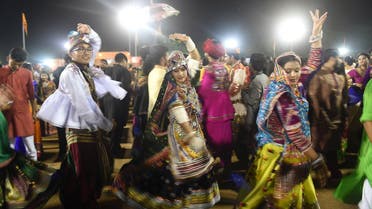 This September 28, 2017 picture shows Indian folk dancers performing during the Navratri festival in Gandhinagar, near Ahmedabad. (AFP)