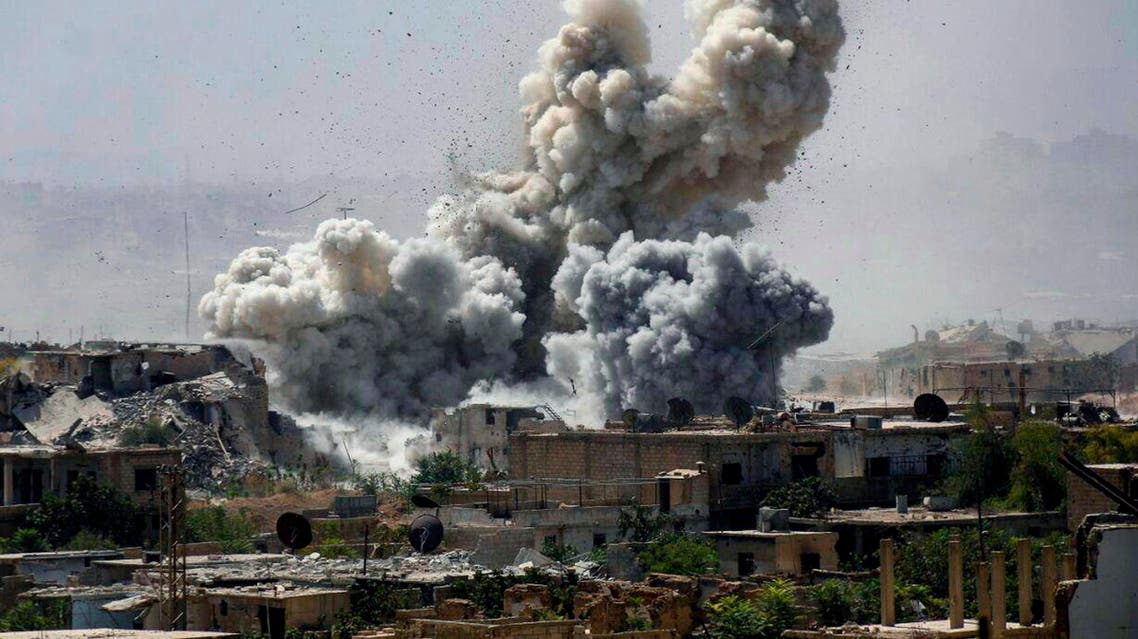 This photo provided Monday, Sept 25, 2017, by the Ghouta Media Center, a Syrian activist media group, shows smoke and debris rising after Syrian government shelling of the rebel-held Jobar neighborhood of Damascus, Syria. ap