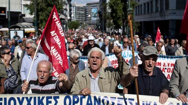 Protesting pensioners chant anti-austerity slogans as they demonstrate in central Athens, Tuesday, Oct. 3, 2017. Pension associations launched a 10-day nationwide protest campaign, starting in Athens, against further bailout-related pension payment cuts planned over the next two years. (AP Photo/Petros Giannakouris)