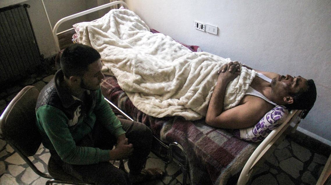 A picture taken on April 6, 2017 shows 40-year-old Hassan Youssef, a victim of the April 4, 2017 suspected toxic gas attack in Khan Sheikhun, receiving medical care in a hospital in the nearby northwestern Syrian city of Idlib. (AFP)