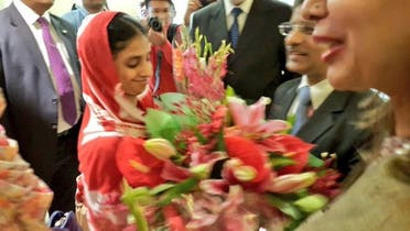 Geeta is flooded with bouquets in October 2015 as New Delhi celebrates the “return of India’s daughter”. (Supplied)