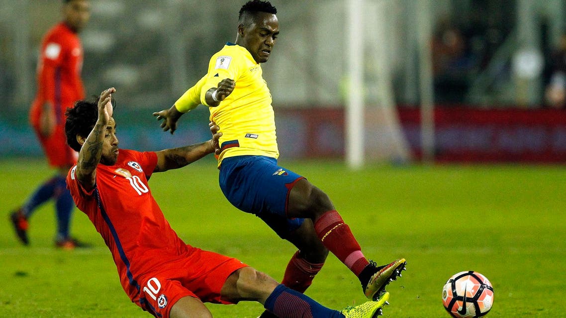 Ecuador’s Renato Ibarra and Chile’s Jorge Valdivia vie for the ball during their 2018 World Cup football qualifier match in Santiago on October 5, 2017. (AFP)
