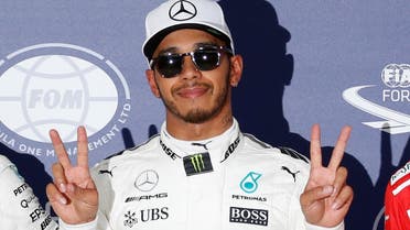 Mercedes’ Lewis Hamilton of Britain celebrates after getting pole position in qualifying on October 7, 2017 at the Suzuka Circuit, Japan. (Reuters) 