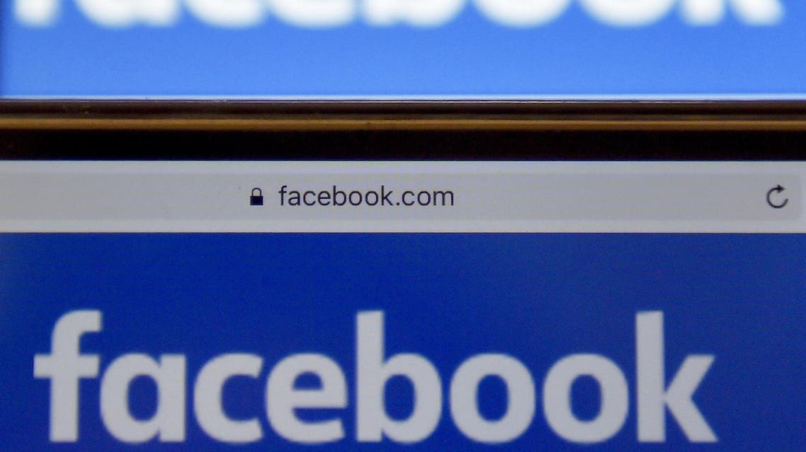 (FILES) This file photo taken on December 28, 2016 in Vertou, western France, shows logos of US online social media and social networking service Facebook. Facebook said October 5, 2017 it was testing a new "button" to allow users to get more context about a news source, in the latest move by the leading social network to curb misinformation.The new feature will allow users to get context on the source of a news article with a single click without leaving Facebook and its news feed. AFP