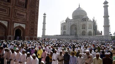 Indian Muslims offer Eid al-Fitr prayers by the Taj Mahal in Agra on June 26, 2017. (AFP)