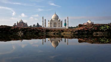 The Taj Mahal is reflected in a puddle in Agra on August 9, 2016. (Reuters)